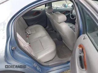 1999 Mercury Sable LS z VIN 1MEFM53S5XA647862, wystawiony jako IAAI lot #41762714 z przebiegiem 165 490 mil mil oraz . Historia ofert i sprzedaży dostępna na DreamBid. Obrazek 8.