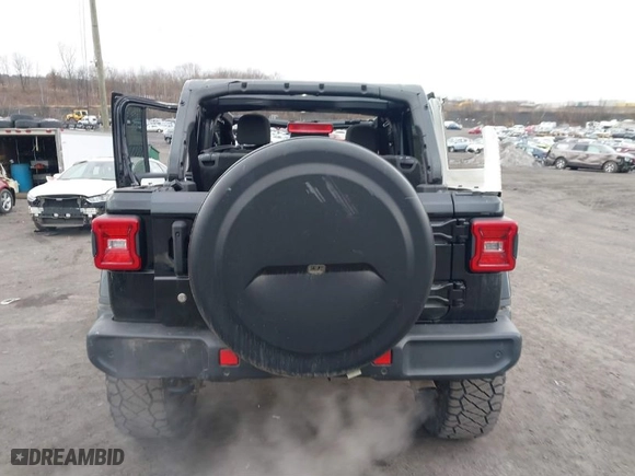 2018 Jeep Wrangler Unlimited Sahara with VIN 1C4HJXEG6JW289575, listed as a IAAI auction lot 41629737 with 74,654 mi miles. Bid and sale history available at carsss.com. Image 16.