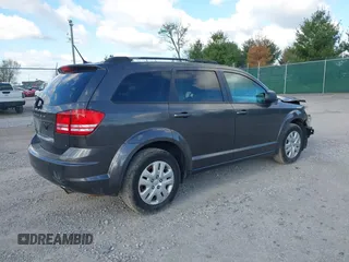 2017 Dodge Journey SE with VIN 3C4PDCAB0HT701477, listed as a IAAI auction lot 42025733 with 168,269 mi miles and . Bid and sale history available at DreamBid. Image 4.