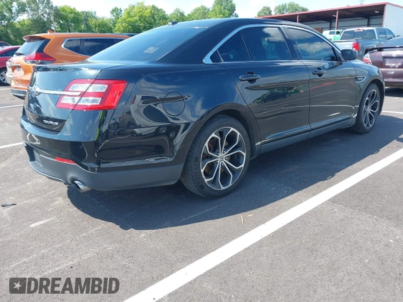 2013 Ford Taurus SHO z VIN 1FAHP2KT1DG135962, wystawiony jako IAAI lot #42449604 z przebiegiem 138 921 mil mil oraz . Historia ofert i sprzedaży dostępna na DreamBid. Obrazek 4.