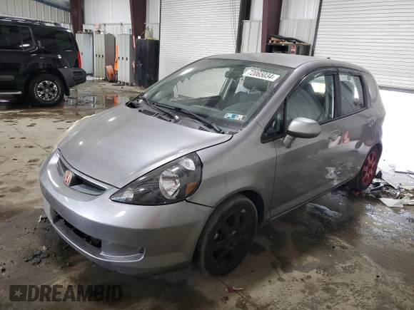 2007 Honda Fit with VIN JHMGD38437S002477, listed as a Copart auction lot 72065034 with 59,192 mi miles and Salvage Title. Bid and sale history available at carsss.com. Image 1.
