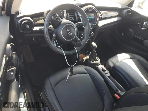 2019 MINI Hardtop Cooper z VIN WMWXP5C52K2H29767, wystawiony jako Copart lot #61006445 z przebiegiem 50 212 mil mil oraz Szkoda całkowita • Salvage title. Historia ofert i sprzedaży dostępna na DreamBid. Obrazek 8.