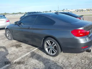 2014 BMW 4 Series 428i xDrive with VIN WBA3N5C57EK196790, listed as a IAAI auction lot 40571670 with 108,114 mi miles and . Bid and sale history available at DreamBid. Image 3.