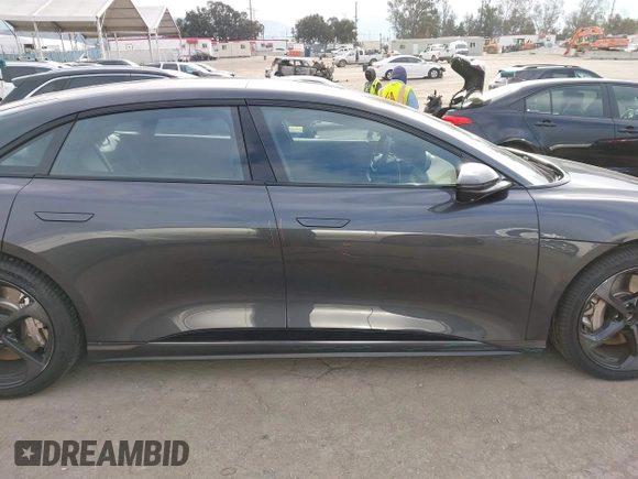 2024 Lucid Air Touring z VIN 50EA1TEA9RA005804, wystawiony jako IAAI lot #41758631 z przebiegiem 13 218 mil mil oraz . Historia ofert i sprzedaży dostępna na DreamBid. Obrazek 13.