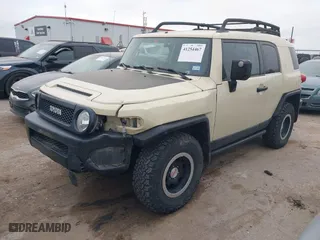 2010 Toyota FJ Cruiser with VIN JTEBU4BF2AK073829, listed as a IAAI auction lot 41254467 with 140,787 mi miles. Bid and sale history available at carsss.com. Image 17.