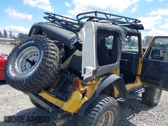 2003 Jeep Wrangler Rubicon with VIN 1J4FA69S93P302102, listed as a IAAI auction lot 42312951 with 146,408 mi miles and . Bid and sale history available at DreamBid. Image 6.