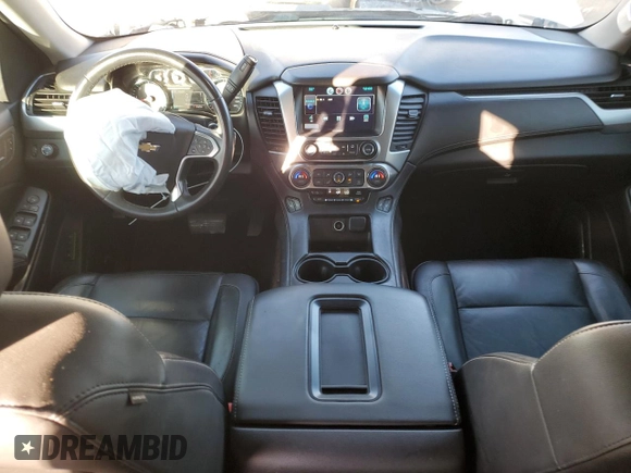2015 Chevrolet Tahoe LT with VIN 1GNSCBKC2FR738042, listed as a Copart auction lot 84856214 with 144,325 mi miles and Salvage title. Bid and sale history available at DreamBid. Image 8.