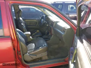 1999 Isuzu Rodeo S with VIN 4S2CK58W3X4307201, listed as a IAAI auction lot 41884901 with 236,970 mi miles. Bid and sale history available at carsss.com. Image 5.