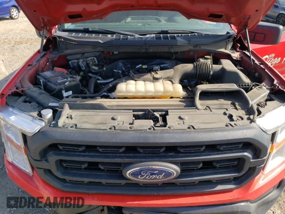 2021 Ford F-150 XL z VIN 1FTMF1CP3MKD82677, wystawiony jako Copart lot #82826014 z przebiegiem 98 441 mil mil oraz Szkoda całkowita • Salvage title. Historia ofert i sprzedaży dostępna na DreamBid. Obrazek 11.