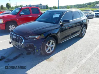 2021 Audi Q5 Premium z VIN WA1AAAFY9M2076387, wystawiony jako IAAI lot #42303925 z przebiegiem 46 954 mil mil oraz . Historia ofert i sprzedaży dostępna na DreamBid. Obrazek 18.
