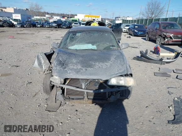 2001 Nissan Sentra GXE z VIN 3N1CB51D01L473085, wystawiony jako IAAI lot #41615385 z przebiegiem 38 731 mil mil oraz . Historia ofert i sprzedaży dostępna na DreamBid. Obrazek 13.