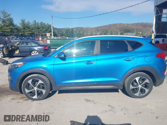 2016 Hyundai Tucson Eco with VIN KM8J3CA24GU054350, listed as a IAAI auction lot 41983769 with 132,424 mi miles. Bid and sale history available at carsss.com. Image 14.