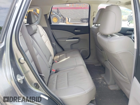 2012 Honda CR-V EX-L with VIN 2HKRM4H73CH634074, listed as a IAAI auction lot 42611285 with 299,348 mi miles and . Bid and sale history available at DreamBid. Image 8.
