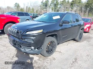 2015 Jeep Cherokee Limited with VIN 1C4PJMDS9FW710969, listed as a IAAI auction lot 41898698 with 144,789 mi miles. Bid and sale history available at carsss.com. Image 2.