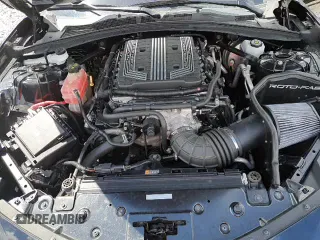 2018 Chevrolet Camaro ZL1 z VIN 1G1FK3D61J0144428, wystawiony jako Copart lot #70531105 z przebiegiem 18 729 mil mil oraz Szkoda całkowita • Salvage title. Historia ofert i sprzedaży dostępna na DreamBid. Obrazek 13.