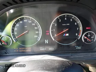 2014 BMW M5 z VIN WBSFV9C54ED593281, wystawiony jako IAAI lot #42063656 z przebiegiem 104 517 mil mil oraz . Historia ofert i sprzedaży dostępna na DreamBid. Obrazek 7.