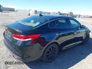 2016 Kia Optima LX with VIN 5XXGT4L32GG108695, listed as a IAAI auction lot 41647970 with 125,319 mi miles. Bid and sale history available at carsss.com. Image 4.