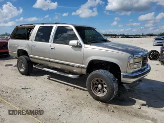 1999 GMC Suburban with VIN 3GKFK16R8XG531621, listed as a Copart auction lot 46593105 with 221,125 mi miles and Salvage Title. Bid and sale history available at carsss.com. Image 4.