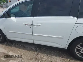 2011 Honda Odyssey EX-L with VIN 5FNRL5H60BB026171, listed as a IAAI auction lot 42511296 with 288,827 mi miles and . Bid and sale history available at DreamBid. Image 21.