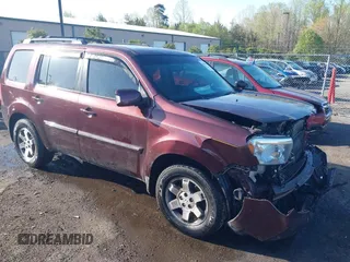2011 Honda Pilot Touring z VIN 5FNYF4H9XBB040893, wystawiony jako IAAI lot #41933530 z przebiegiem 161 725 mil mil oraz . Historia ofert i sprzedaży dostępna na DreamBid. Obrazek 1.