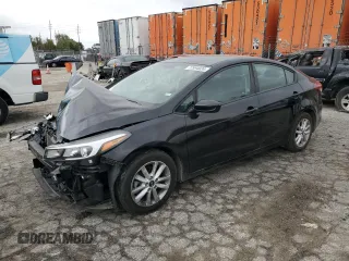 2017 Kia Forte LX with VIN 3KPFL4A79HE126588, listed as a Copart auction lot 77994024 with 82,033 mi miles and Salvage Title. Bid and sale history available at carsss.com. Image 1.