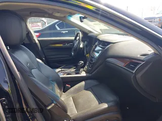 2014 Cadillac CTS RWD with VIN 1G6AP5SX0E0126103, listed as a IAAI auction lot 42160002 with 49,187 mi miles and . Bid and sale history available at DreamBid. Image 5.