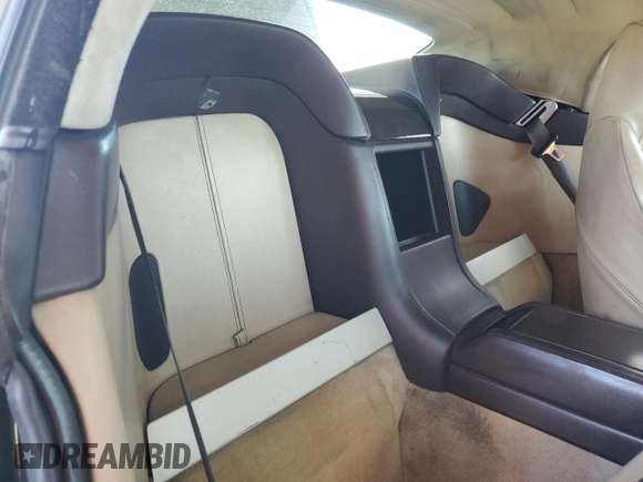 2009 Aston Martin Vantage z VIN SCFBF04CX9GD11858, wystawiony jako Copart lot #53907885 z przebiegiem 87 495 mil mil oraz Szkody całkowita. Historia ofert i sprzedaży dostępna na DreamBid. Obrazek 10.