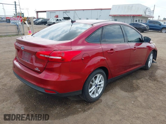 2015 Ford Focus SE with VIN 1FADP3F24FL323536, listed as a IAAI auction lot 41876148 with 221,050 mi miles. Bid and sale history available at carsss.com. Image 4.