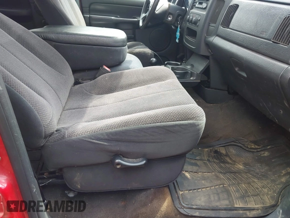 2003 Dodge 1500 SLT z VIN 1D7HU18N93J593469, wystawiony jako IAAI lot #42434581 z przebiegiem 186 804 mil mil oraz . Historia ofert i sprzedaży dostępna na DreamBid. Obrazek 5.