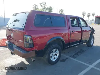 2014 Ram 1500 Big Horn with VIN 1C6RR7LG9ES336330, listed as a IAAI auction lot 42183628 with 152,838 mi miles and . Bid and sale history available at DreamBid. Image 4.