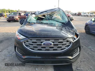 2020 Ford Edge SEL с VIN 2FMPK4J90LBB57040, выставлен на аукционе Copart как лот 62237005 с пробегом Не указан миль и Списание • Salvage title. История ставок и продаж доступна на DreamBid. Изображение 5.