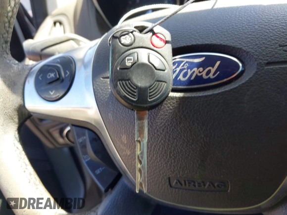 2014 Ford Focus SE with VIN 1FADP3F25EL199002, listed as a IAAI auction lot 41872781 with 150,548 mi miles. Bid and sale history available at carsss.com. Image 11.