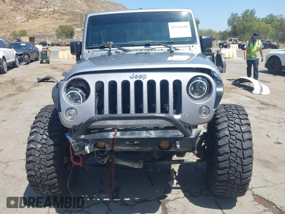 2018 Jeep Wrangler Unlimited Sport with VIN 1C4BJWDG4JL807265, listed as a IAAI auction lot 42520648 with 69,229 mi miles and . Bid and sale history available at DreamBid. Image 13.