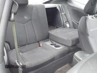 2013 Hyundai Veloster w/Black Int с VIN KMHTC6AD9DU155259, выставлен на аукционе IAAI как лот 42361365 с пробегом 261 896 миль миль и . История ставок и продаж доступна на DreamBid. Изображение 8.