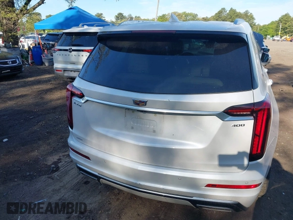 2022 Cadillac XT6 Premium Luxury z VIN 1GYKPDRS3NZ124924, wystawiony jako IAAI lot #42215418 z przebiegiem 32 368 mil mil oraz . Historia ofert i sprzedaży dostępna na DreamBid. Obrazek 16.