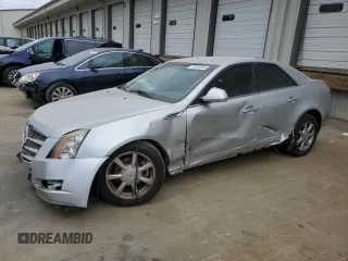 2009 Cadillac CTS RWD w/1SA with VIN 1G6DF577590150928, listed as a Copart auction lot 75338354 with 127,997 mi miles and Salvage Title. Bid and sale history available at carsss.com. Image 1.