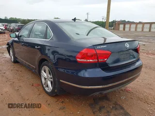 2014 Volkswagen Passat TDI SEL Premium with VIN 1VWCN7A36EC054891, listed as a IAAI auction lot 41964556 with 120,658 mi miles. Bid and sale history available at carsss.com. Image 3.