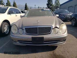 2005 Mercedes-Benz E 5.0L with VIN WDBUF70J75A693702, listed as a Copart auction lot 63497604 with 122,410 mi miles and Clean Title. Bid and sale history available at carsss.com. Image 5.
