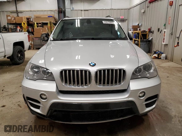 2013 BMW X5 xDrive35i z VIN 5UXZV4C5XD0B23352, wystawiony jako Copart lot #57481655 z przebiegiem 126 891 mil mil oraz Szkody całkowita. Historia ofert i sprzedaży dostępna na DreamBid. Obrazek 5.