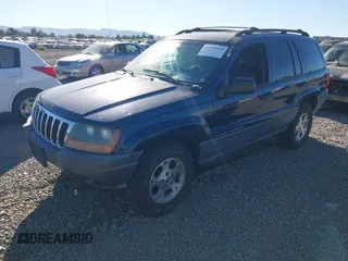 2001 Jeep Grand Cherokee Laredo with VIN 1J4GW48N31C727194, listed as a IAAI auction lot 42703915 with 176,896 mi miles and . Bid and sale history available at DreamBid. Image 2.