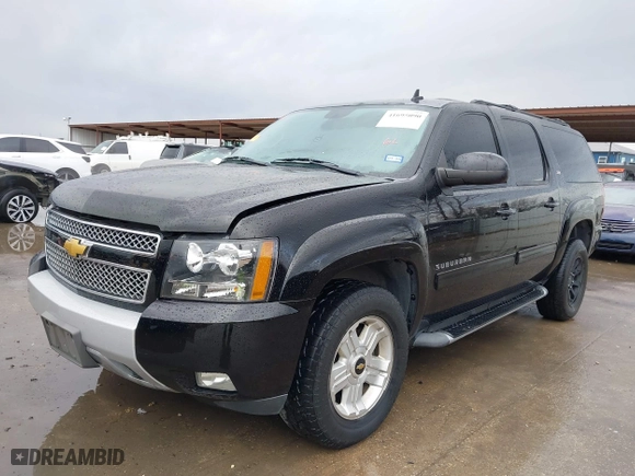 2013 Chevrolet Suburban LT with VIN 1GNSKJE71DR308480, listed as a IAAI auction lot 41695090 with 129,000 mi miles. Bid and sale history available at carsss.com. Image 2.
