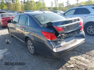 2012 Toyota Avalon with VIN 4T1BK3DB1CU471826, listed as a IAAI auction lot 42020322 with 198,671 mi miles and . Bid and sale history available at DreamBid. Image 3.