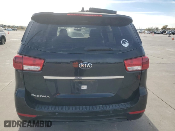 2015 Kia Sedona L with VIN KNDMA5C11F6048368, listed as a Copart auction lot 83772534 with 140,896 mi miles and Clean Title. Bid and sale history available at carsss.com. Image 6.