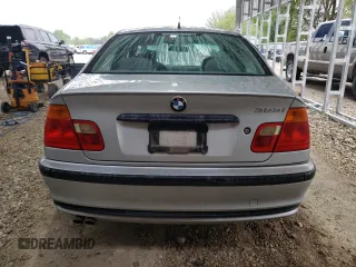 2000 BMW 3 Series 323i with VIN WBAAM3348YFP73443, listed as a Copart auction lot 54165575 with 334,761 mi miles and Salvage title. Bid and sale history available at DreamBid. Image 6.