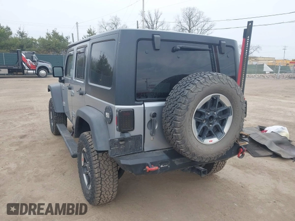 2015 Jeep Wrangler Unlimited Rubicon with VIN 1C4BJWFG1FL546018, listed as a IAAI auction lot 42060045 with 107,249 mi miles and . Bid and sale history available at DreamBid. Image 3.