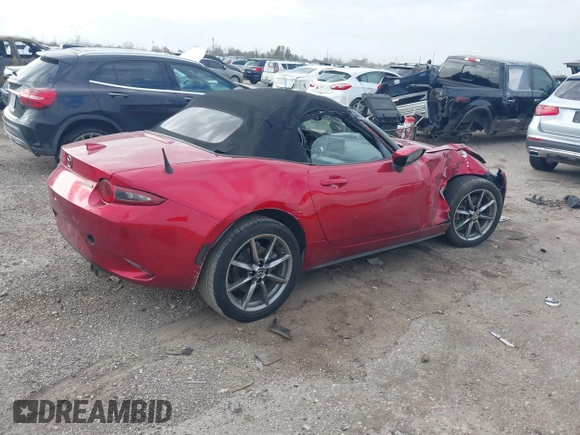 2021 Mazda MX-5 Miata Grand Touring with VIN JM1NDAD79M0454079, listed as a IAAI auction lot 41230199 with 104,783 mi miles and . Bid and sale history available at DreamBid. Image 4.