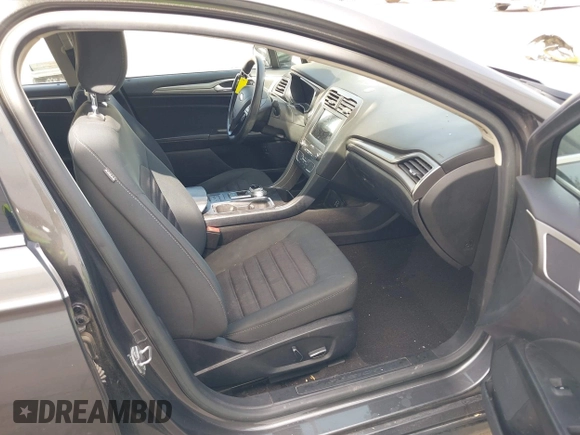 2019 Ford Fusion Hybrid SE with VIN 3FA6P0LU6KR163927, listed as a IAAI auction lot 41834612 with 104,342 mi miles. Bid and sale history available at carsss.com. Image 5.