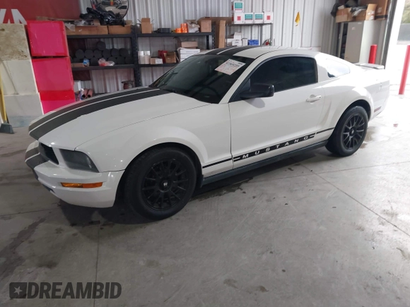 2007 Ford Mustang Deluxe with VIN 1ZVFT80N575259508, listed as a IAAI auction lot 41569259 with 164,315 mi miles. Bid and sale history available at carsss.com. Image 2.
