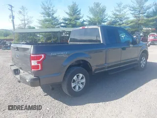 2019 Ford F-150 XL with VIN 1FTEX1EP1KKC64106, listed as a IAAI auction lot 42161813 with 127,387 mi miles. Bid and sale history available at carsss.com. Image 4.