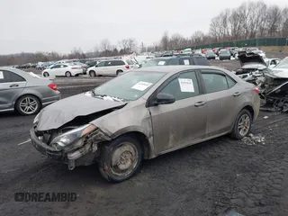 2015 Toyota Corolla L z VIN 2T1BURHE0FC468259, wystawiony jako IAAI lot #41559030 z przebiegiem 299 557 mil mil oraz . Historia ofert i sprzedaży dostępna na DreamBid. Obrazek 2.